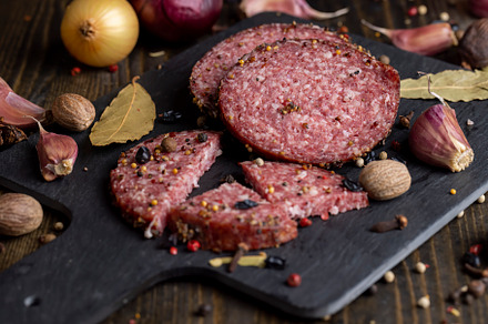 Sliced salami using beef meat with spices, a Background Photo by MyPhotos