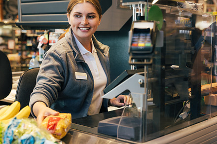 Smiling female cashier working