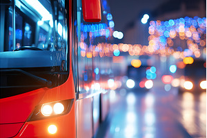 Public transit bus moving through, a Transportation Photo by Lermont51