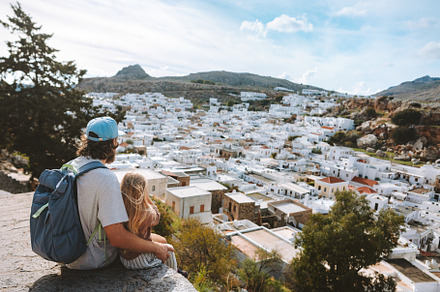 Family father and child traveling in Rhodes island, Greece sightseeing Lindos c, a Person Photo by e v e r s t