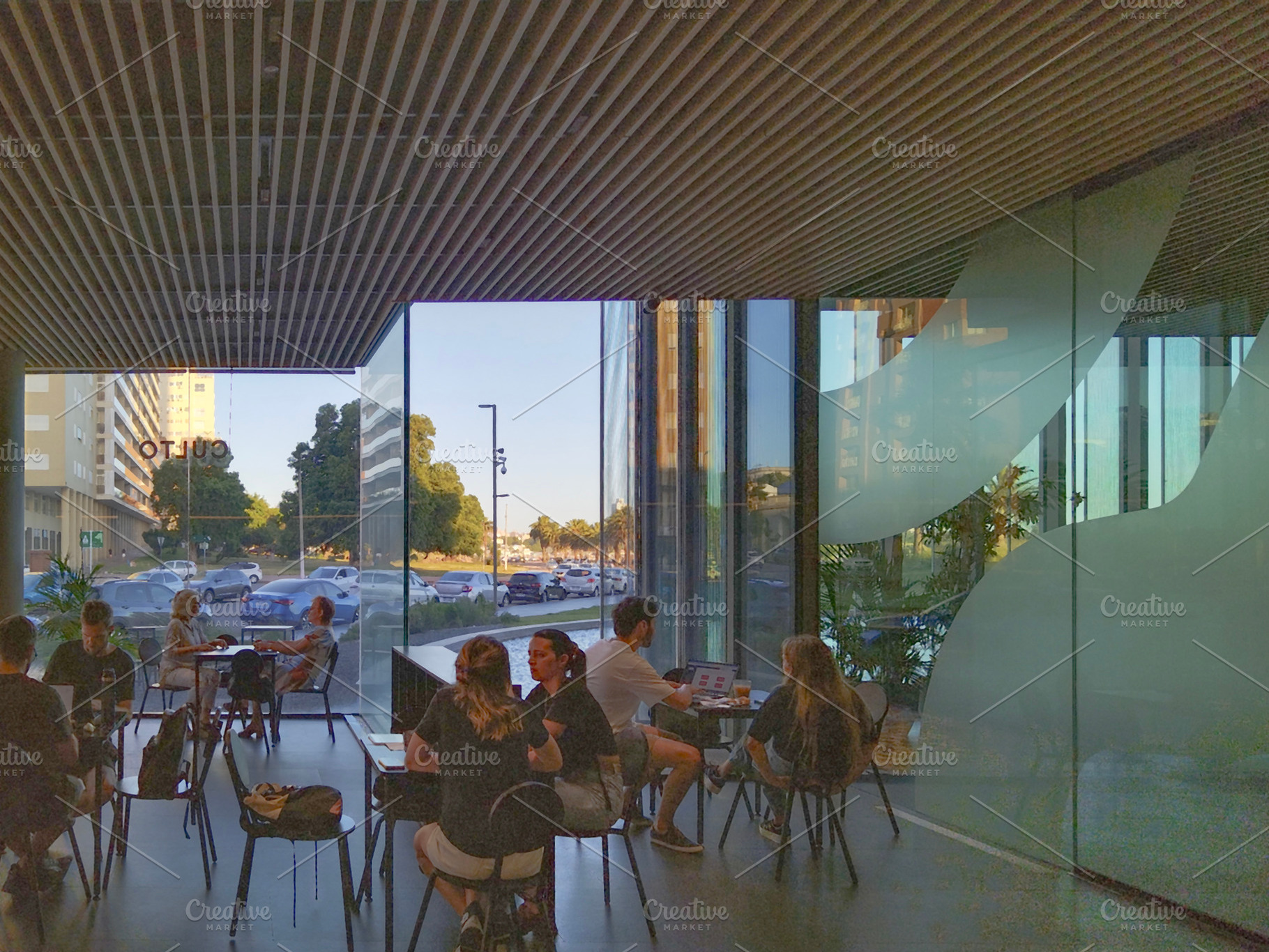 Modern café with glass walls and people, a Food & Drink Photo by DanFLCreativo