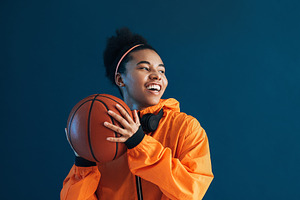 Happy professional basketball player, a Sports & Recreation Photo by Artem Varnitsin