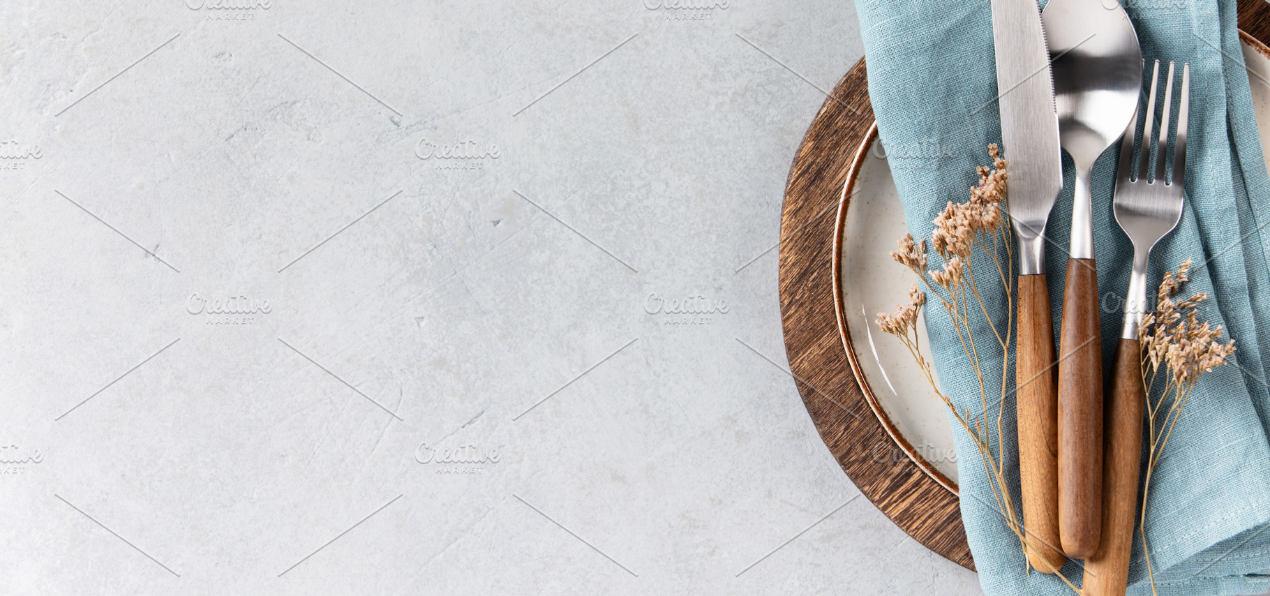 Rustic Table Setting with Blue Linen and Wooden Cutlery on Light, a Food & Drink Photo by Natalia Klenova's Shop