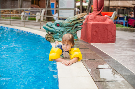LITTLE BOY IN THE POOL AND SMILING, a Nature Photo by Elizaveta Galitskaya