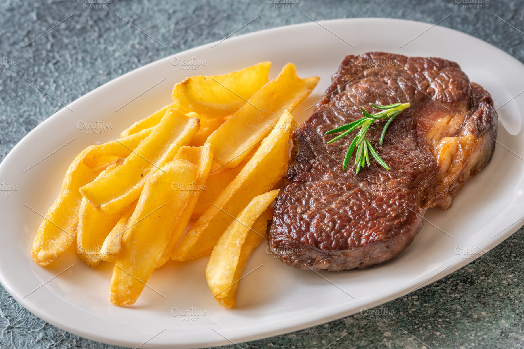 Grilled beef steak with fries, a Food & Drink Photo by Alexander Prokopenko