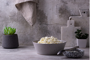 Cottage cheese on light background, a Food & Drink Photo by Yulia Furman