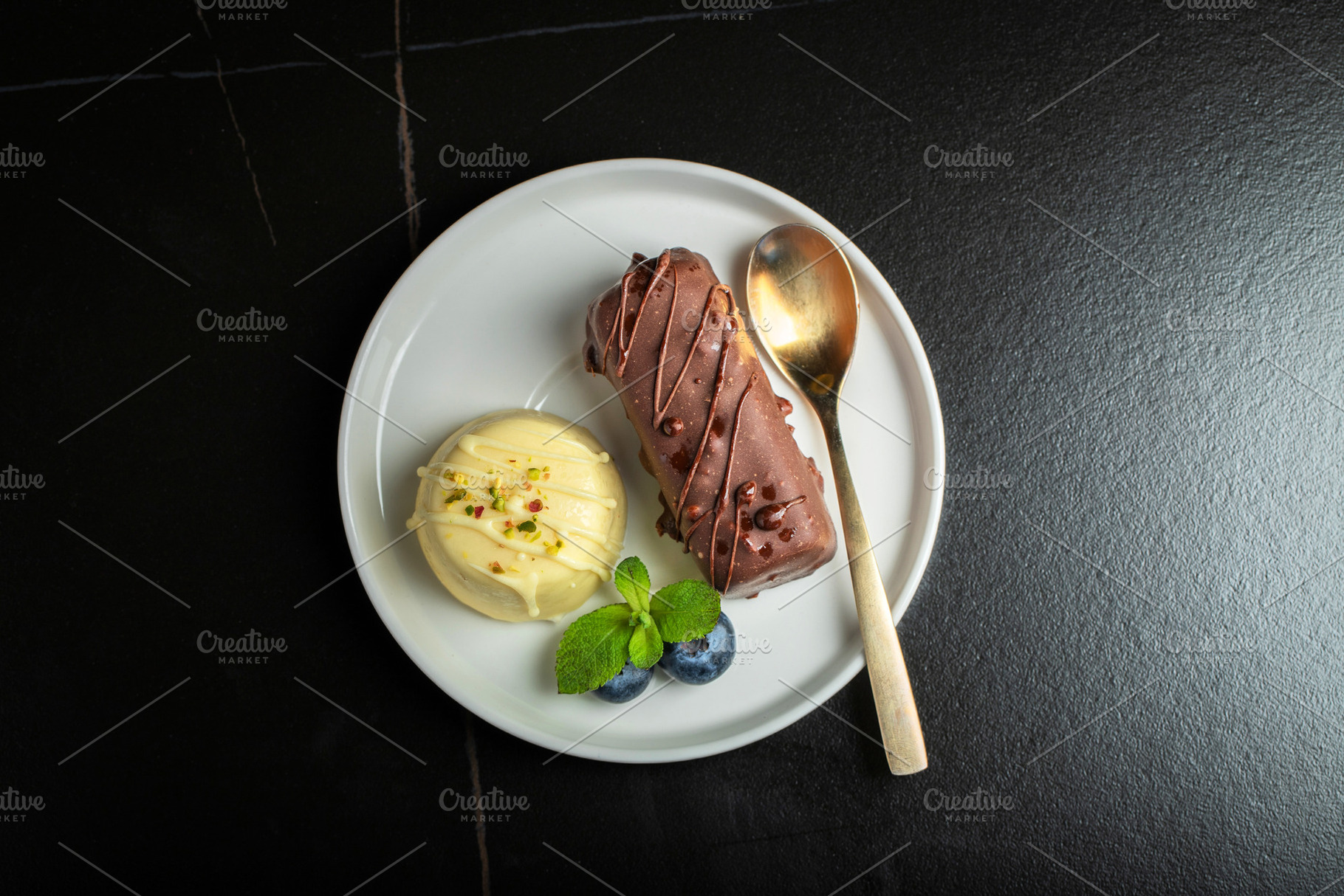 Delicious glazed curd snacks with fresh blueberries and mint on light grey tabl, a Food & Drink Photo by Budarinphoto