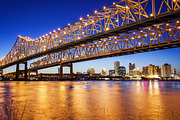 New Orleans City Skyline  & Crescent City Connection Bridge at Night, a Photo by CrackerClips Stock Media (Thumbnail 1 of 2)