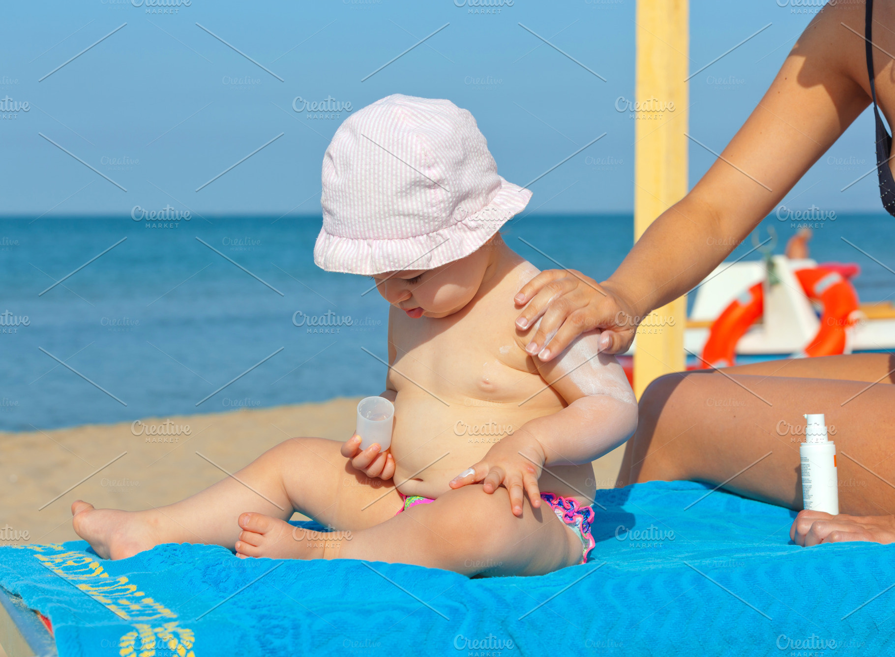 Baby sunscreen cream., a Person Photo by Antonio Gravante Market