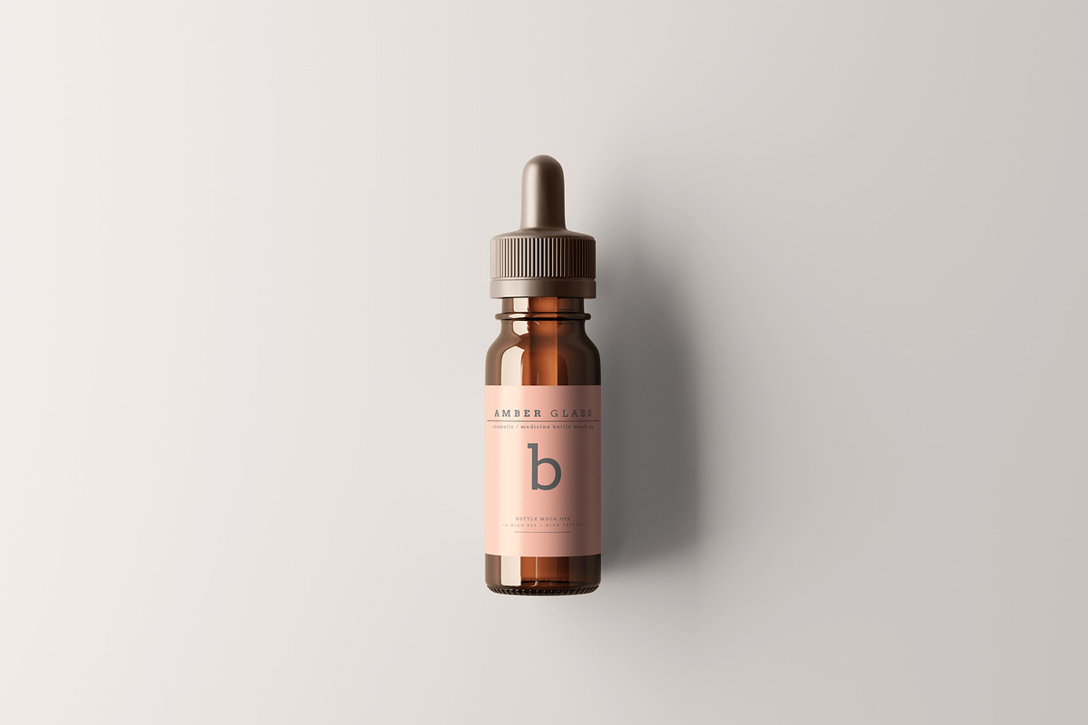 Amber Glass Dropper Bottle Mockups, a Cups & Container Mockup by pmvch (Photo 16 of 20)