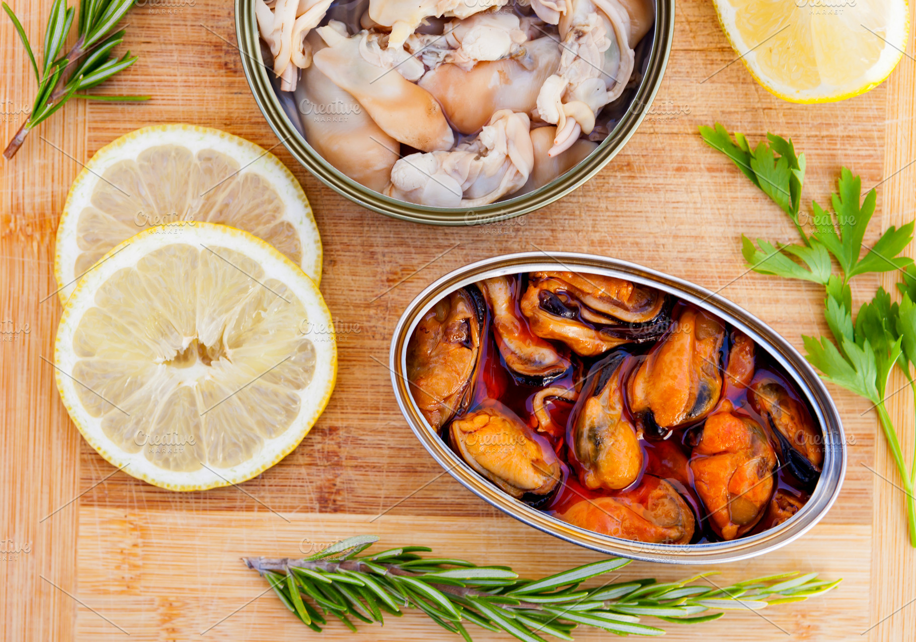 Cans of preserve with lemon and differents herbs, a Food & Drink Photo by José Manuel Gelpi