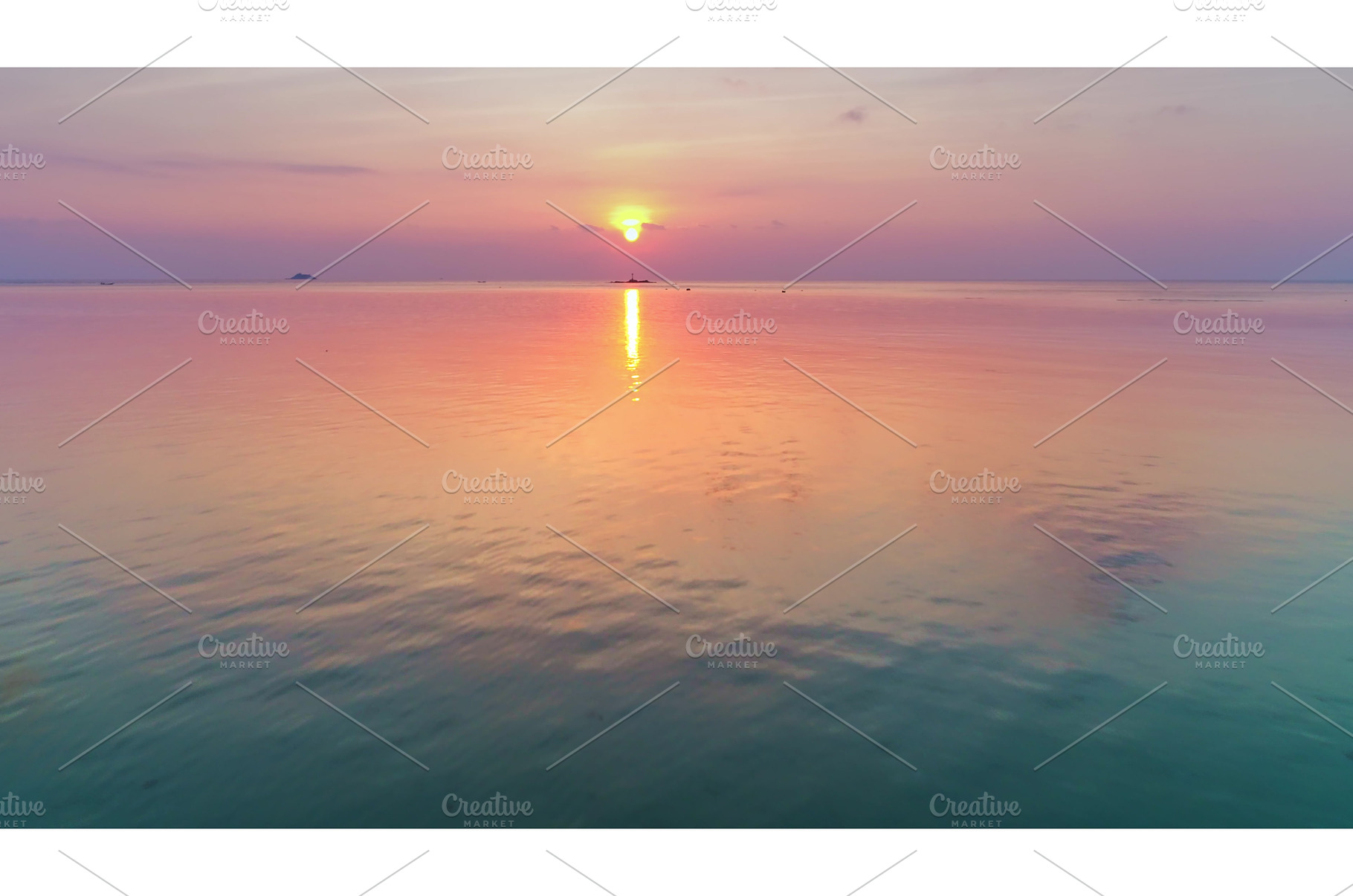 Tropical sunset reflecting on calm, a Nature Photo by Goinyk