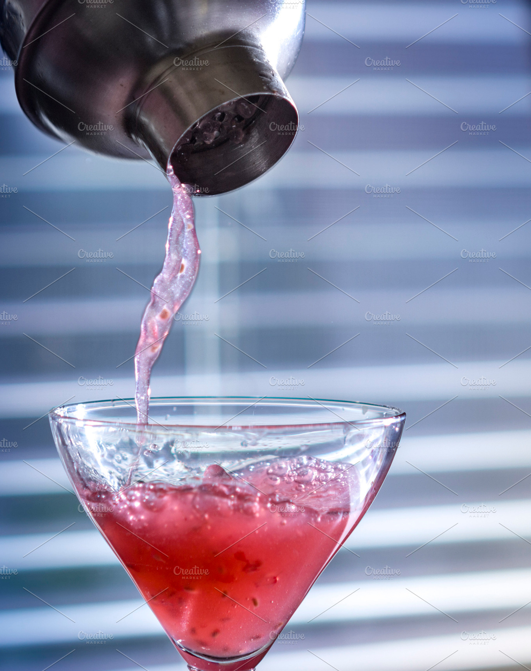 Cocktail Shaker Straining Martini