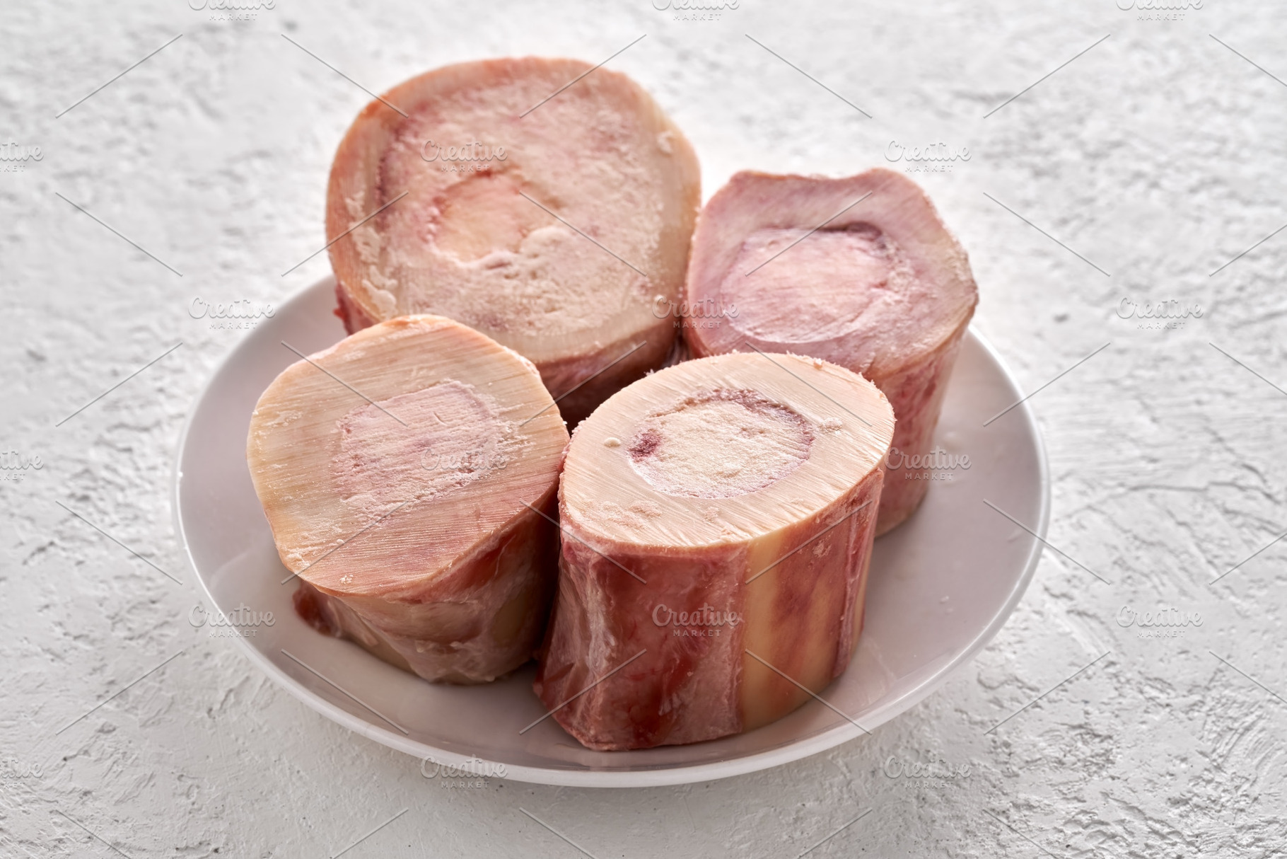 Beef marrow bones - ingredient to prepare broth or soup, a Food & Drink Photo by Madeleine Steinbach