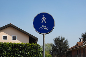 bike and pedestrian lanes sign, a Photo by WorldOfPhotos