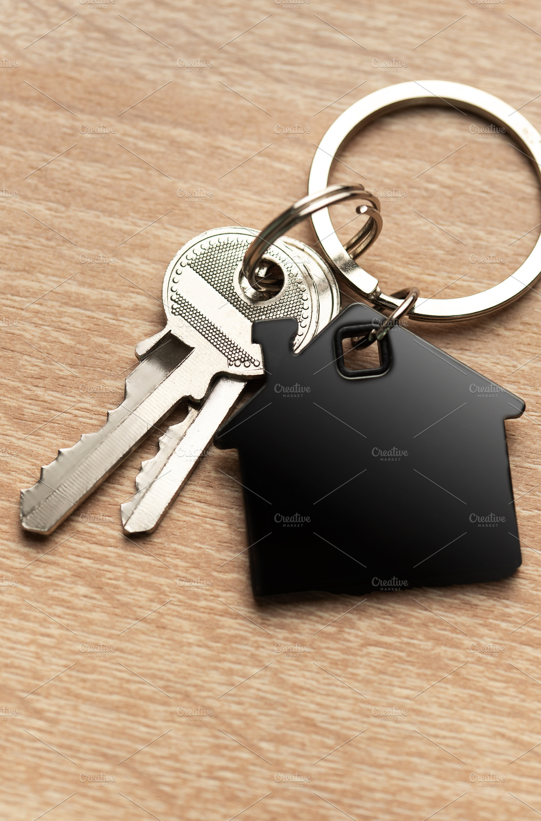 Keys with house shape keychain representing home ownership, a Business Photo by Olena Rudo