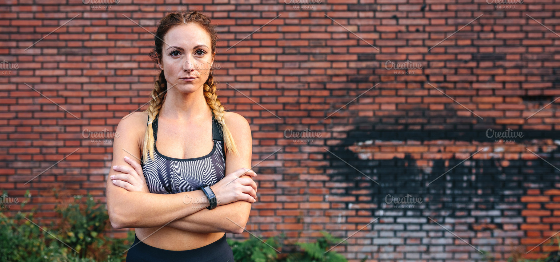 Sportswoman with crossed arms posing, a Sports & Recreation Photo by davidpereiras