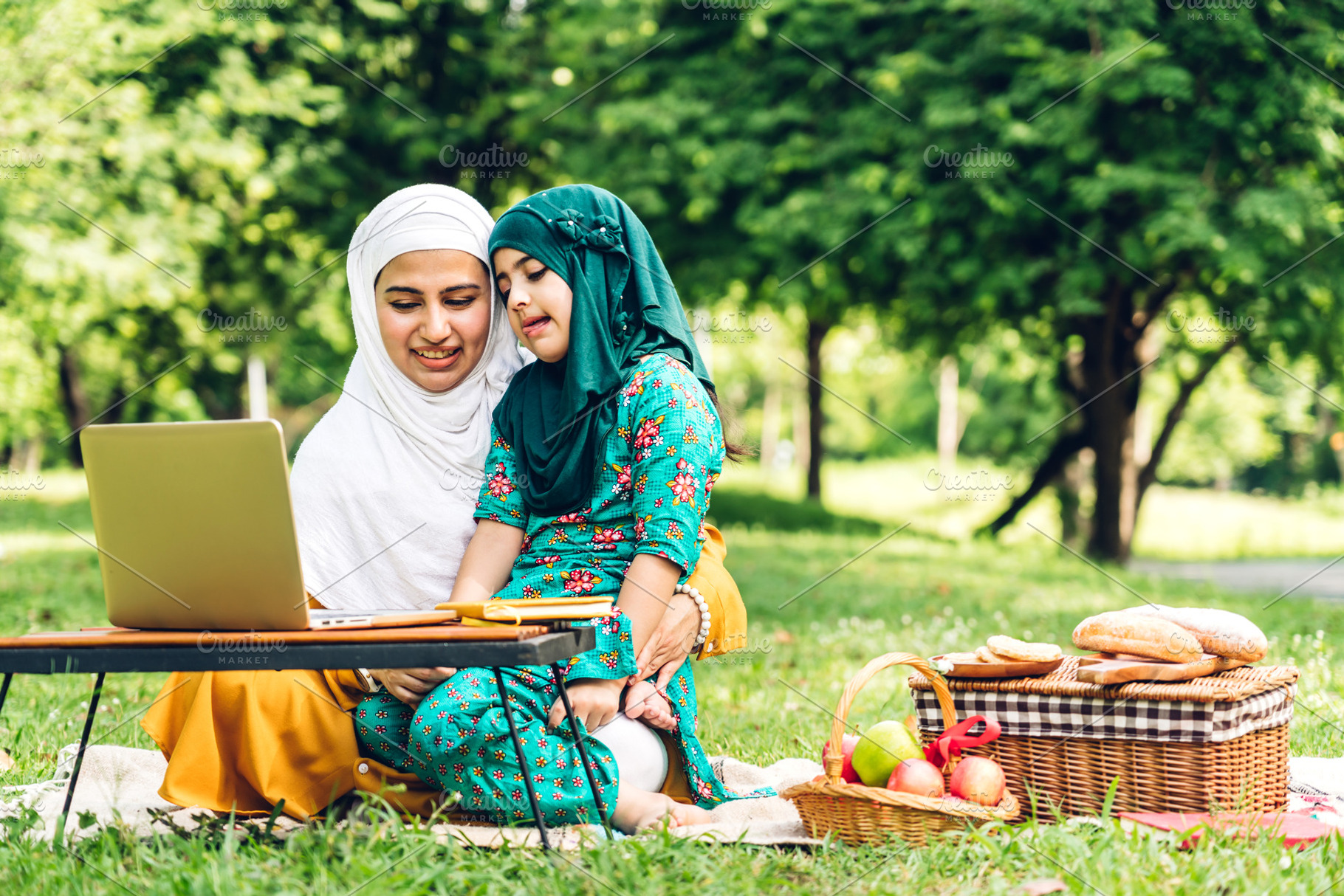 Portrait happy love asian muslim family mother teach little daug, a Person Photo by Art_Photo