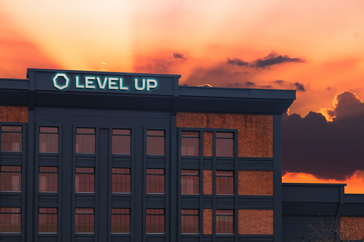2 Logo on building mockup, a Product Mockup by Level up (Photo 3 of 5)