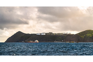 Oil storage terminal and tanker ship, an Industrial Photo by Leonid Andronov