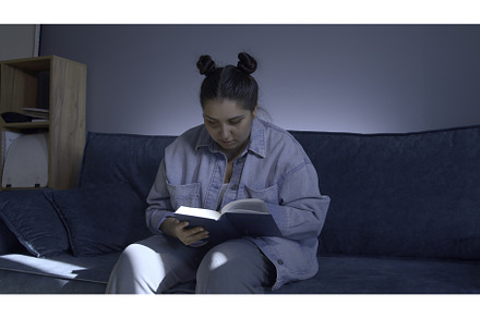 Young cute woman reading book, a School & Education Photo by Media Whale Stock