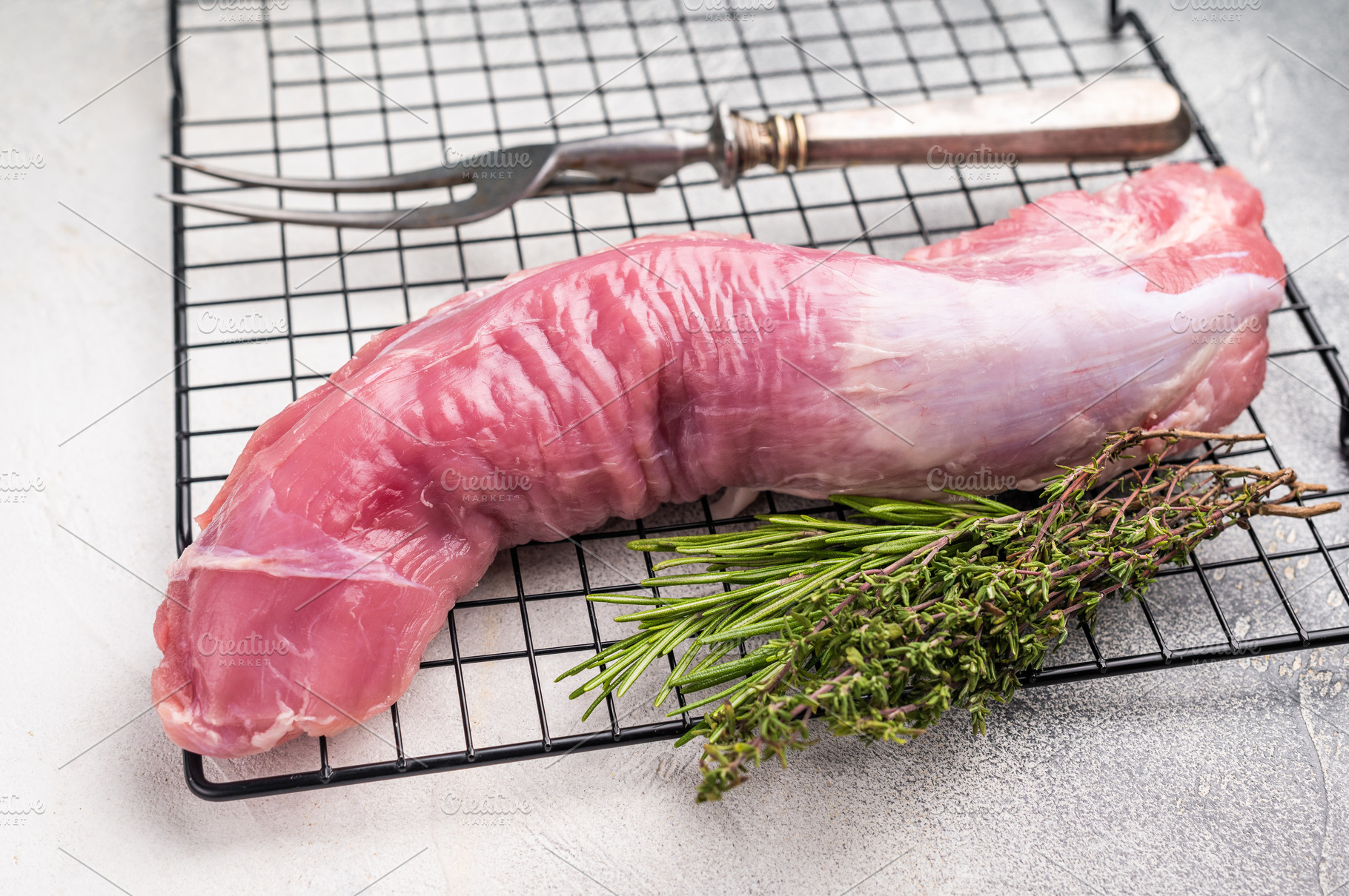 Uncooked pork loin fillet, raw tenderloin ready to be seasoned a, a Food & Drink Photo by composter-box@mail.ru