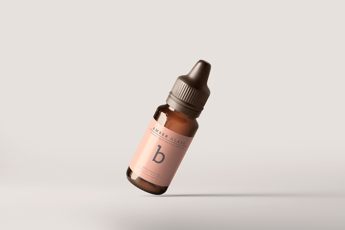 Amber Glass Dropper Bottle Mockups, a Cups & Container Mockup by pmvch (Photo 11 of 20)