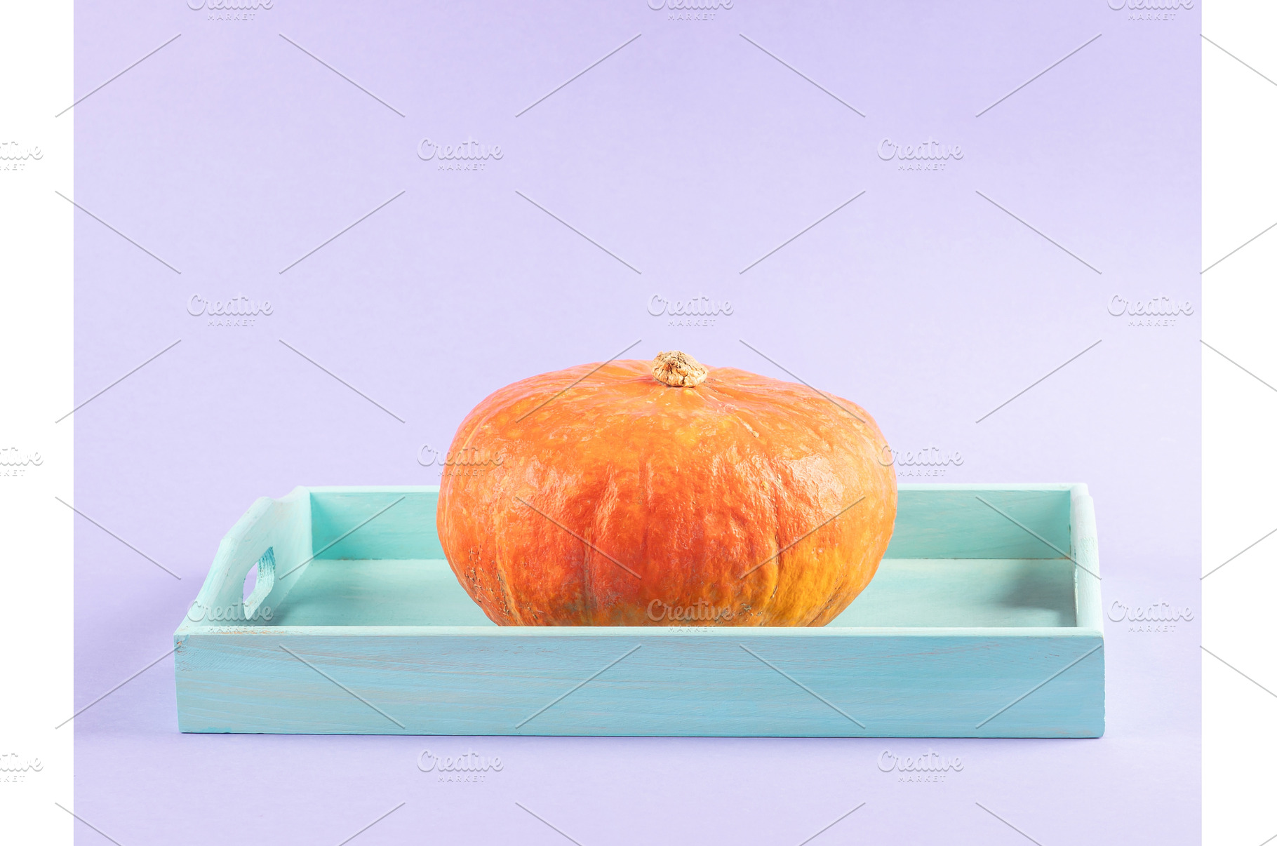 Vibrant orange pumpkin on purple, a Food & Drink Photo by Lifemorning