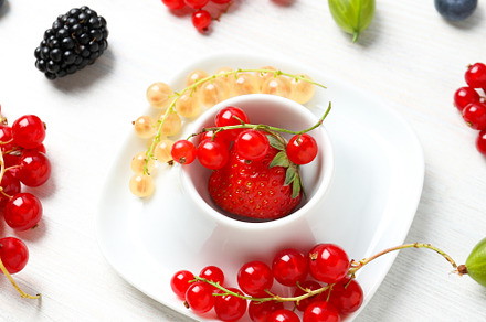 Concept of fresh food on white wooden background, berries, a Food & Drink Photo by AtlasStudio PRO