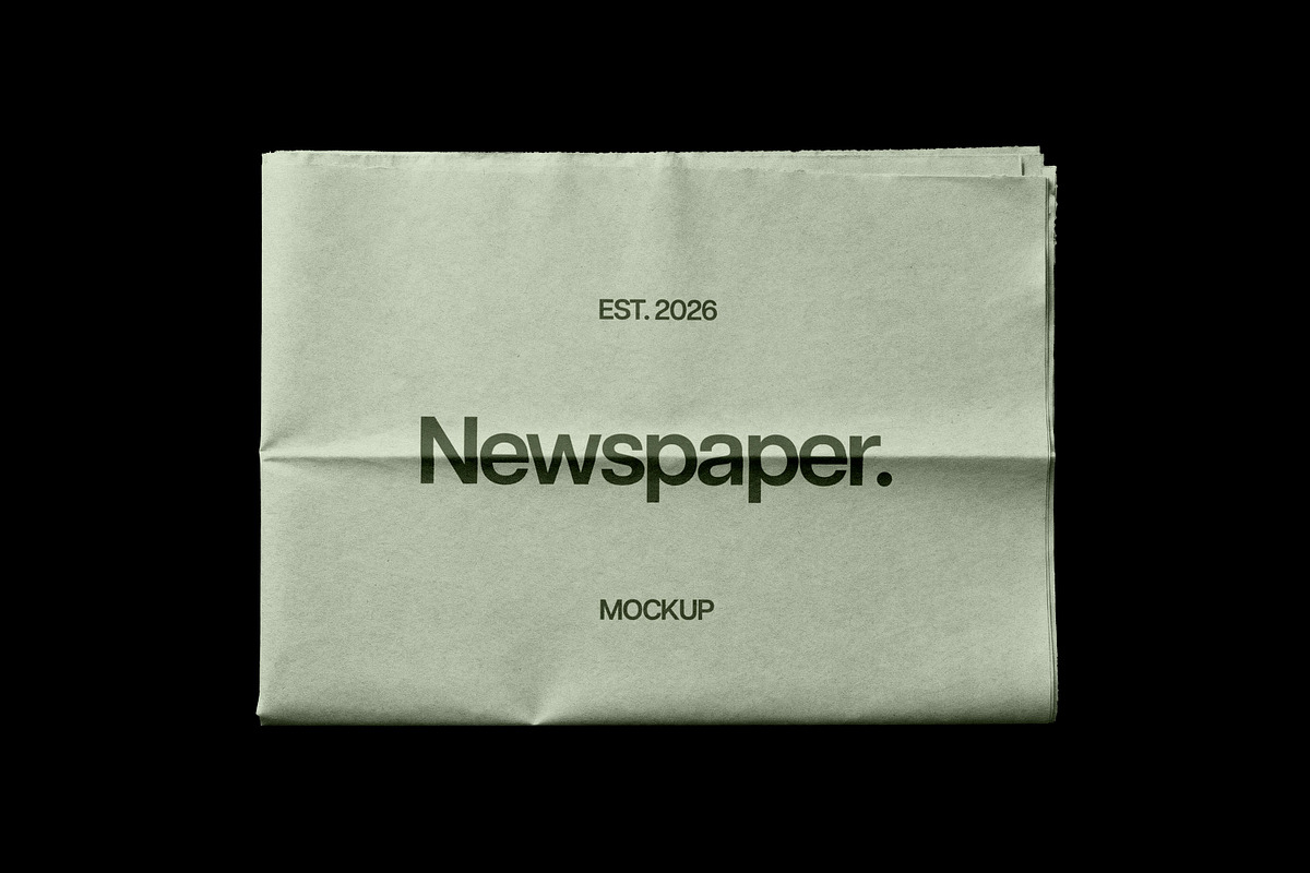 Newspaper Mockup, a Books & Magazine Mockup by Design Squad (Photo 4 of 5)