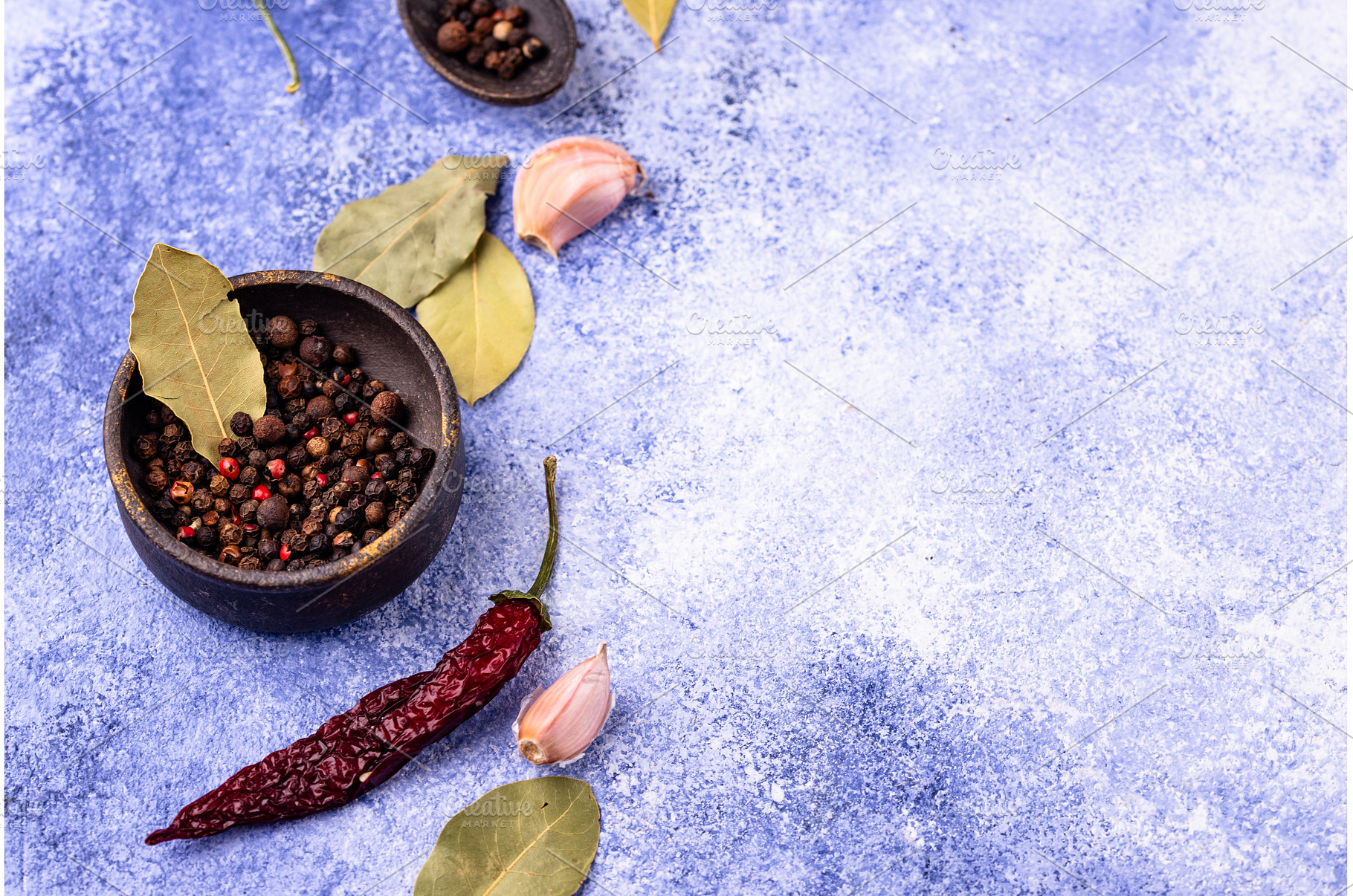 Culinary background with pepper, bay, a Food & Drink Photo by Yulia Furman