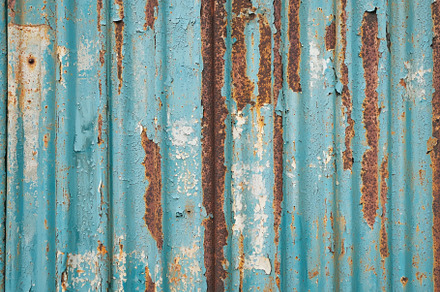 Weathered rusty metal wall with peeling turquoise paint Generative AI, a Holiday Photo by José Manuel Gelpi