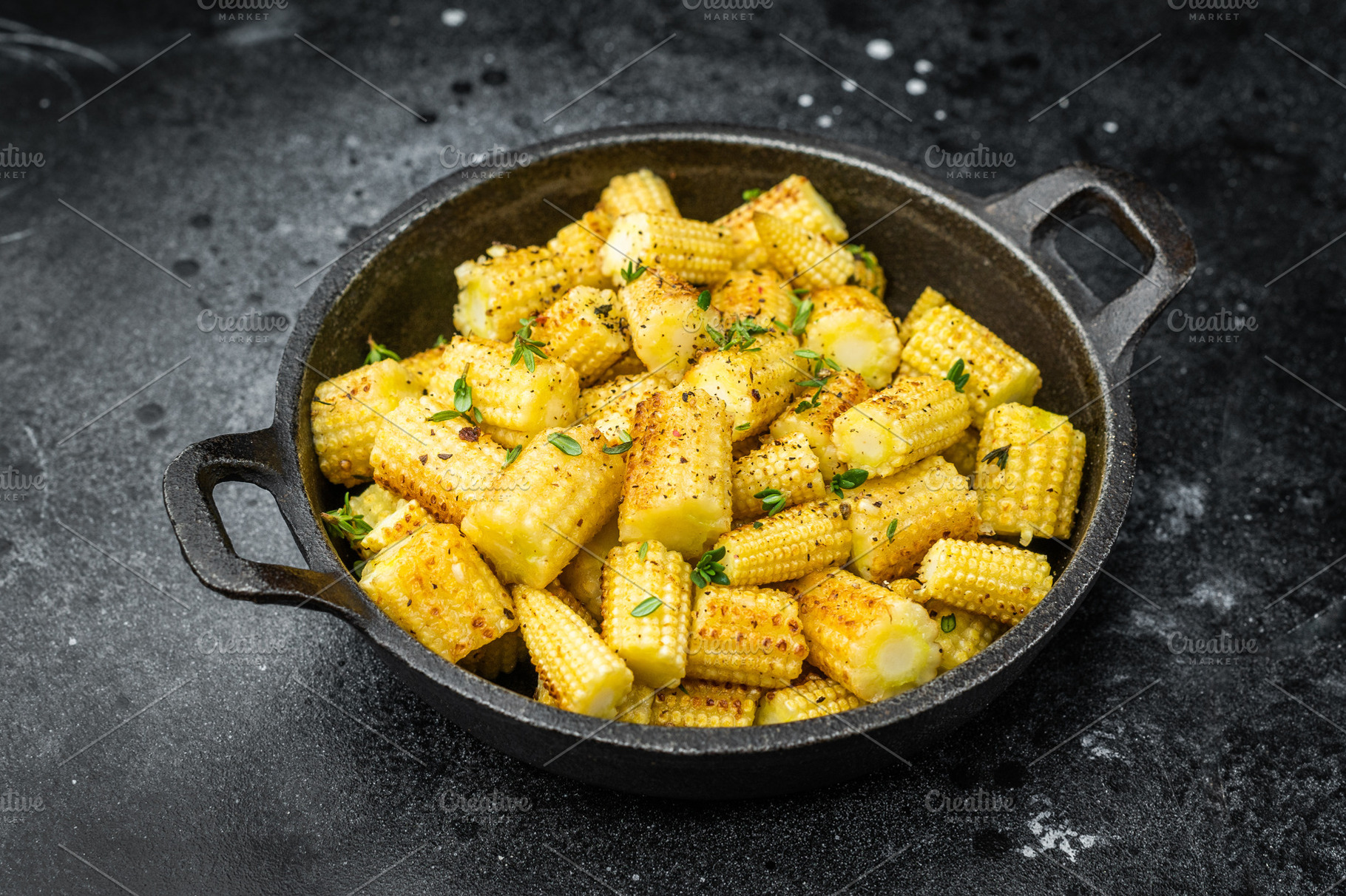 Golden fried baby corn pieces seasoned with spices and thyme ser, a Food & Drink Photo by composter-box@mail.ru