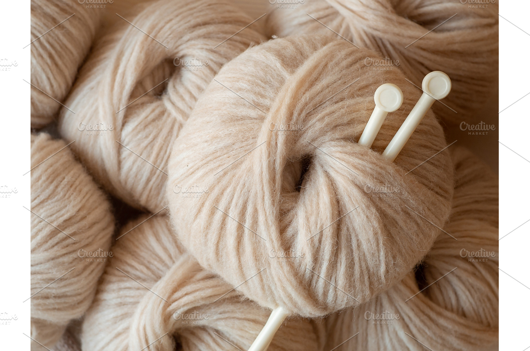 Aesthetic beige yarn skein, close up, an Abstract Photo by Fascinadora