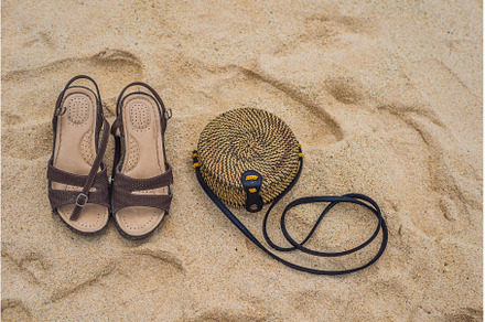 Sandals and Balinese wicker bag on, a Holiday Photo by Elizaveta Galitskaya