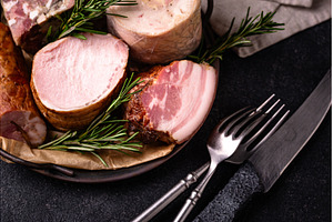 Different meat, sausages, ham and, a Food & Drink Photo by Yulia Furman