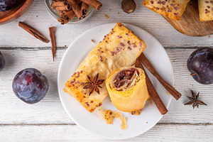 Vertuta, homemade hand pies strudel with sweet plum jam, a Food & Drink Photo by Rimma