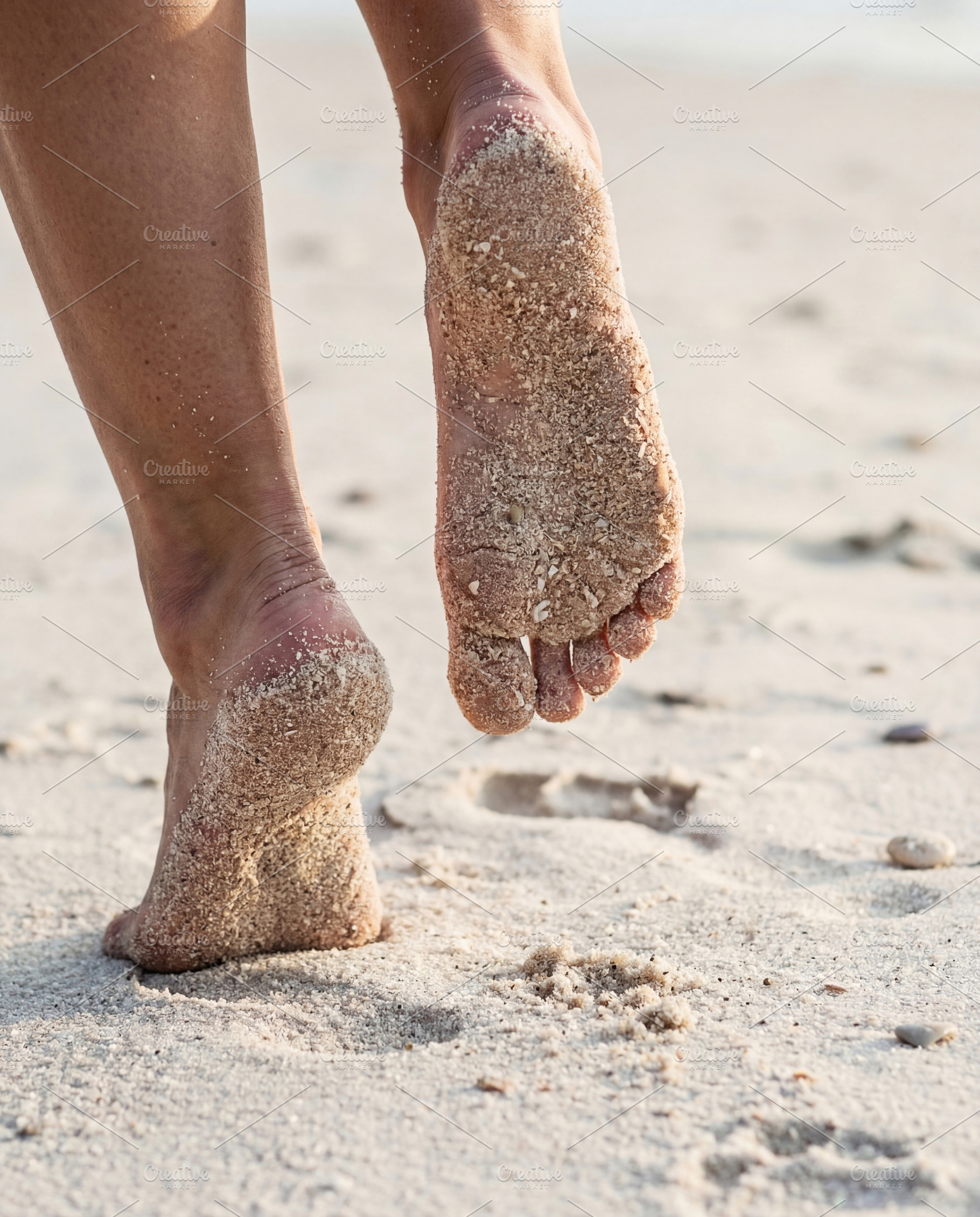 Sandy Bare Feet on Summer Beach, a Person Photo by Virgo Studio