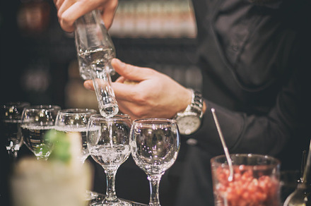 Barman at work containing cocktail, vodka, and gin, a Person Photo by Grafvision photography