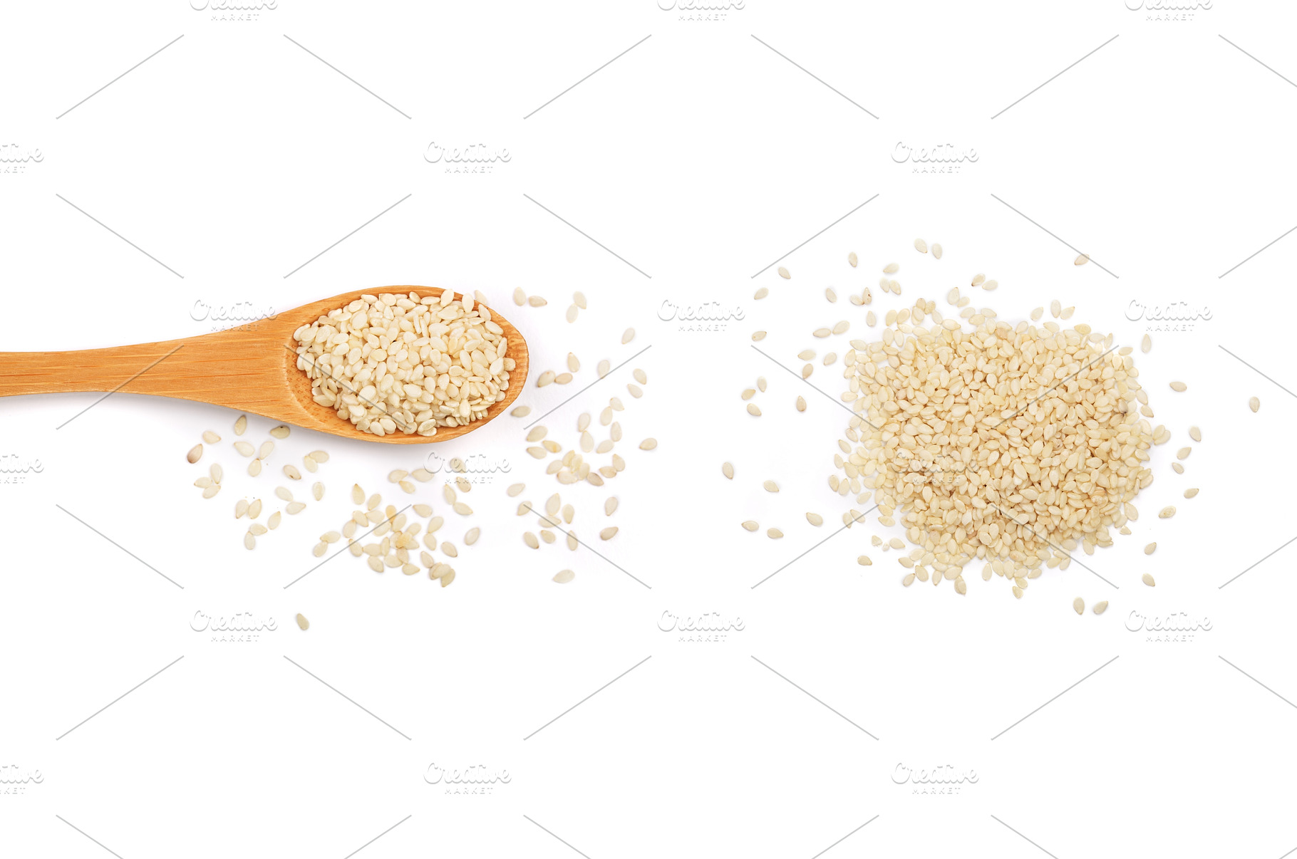 Sesame seeds in a wooden spoon, a Food & Drink Photo by NataPhoto