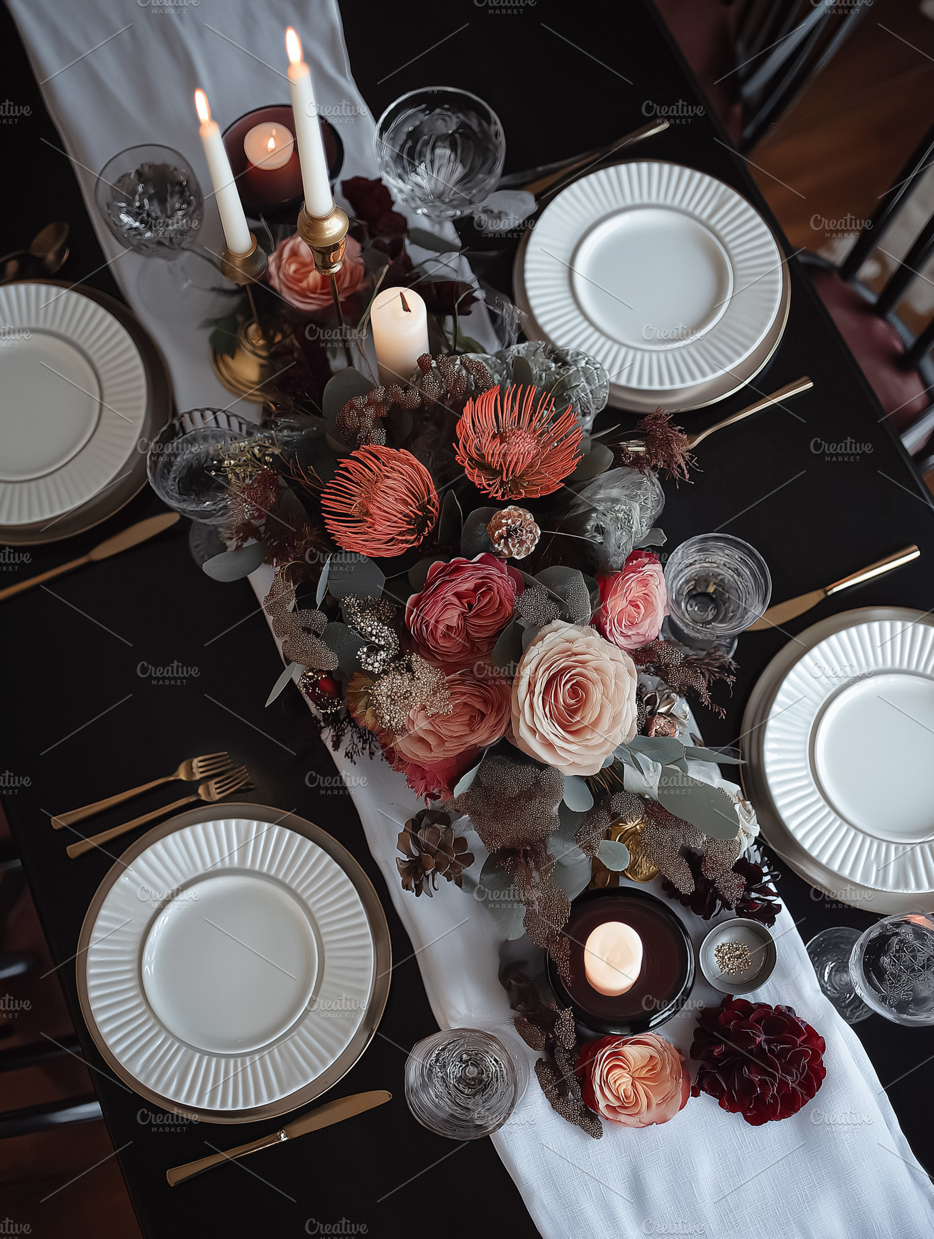 Elegant dinner table setting with floral centerpiece and candles creating a war, a Food & Drink Photo by Studio ANNA