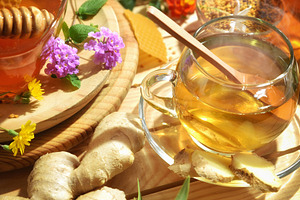 Glass cup with ginger honey and natural herbs drink, a Food & Drink Photo by Davizro's Market