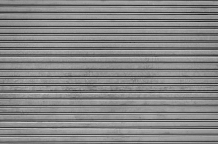 Steel folding garage shutter door background. Texture and Interi, an Architecture Photo by Ministocker