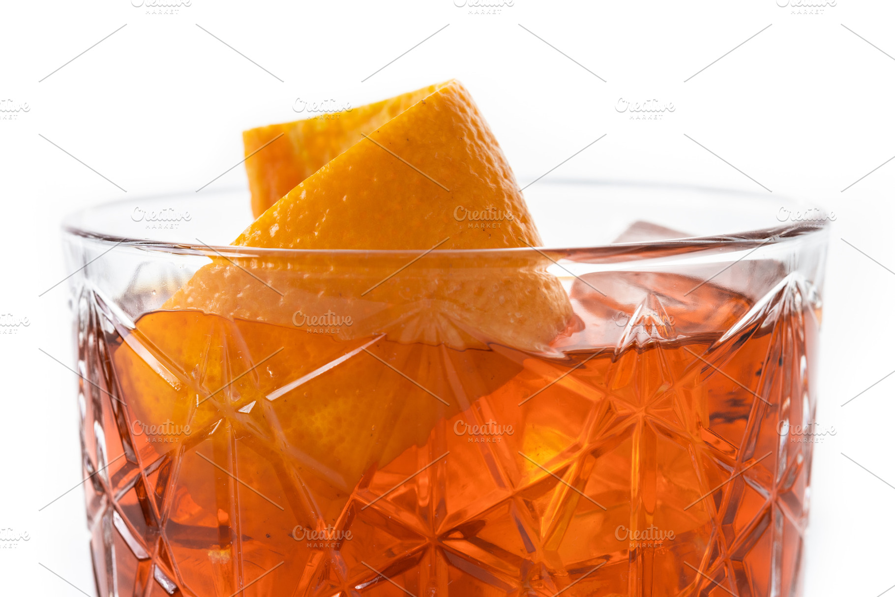 Americano cocktail garnished with twist orange isolated on white background, a Food & Drink Photo by etorres69