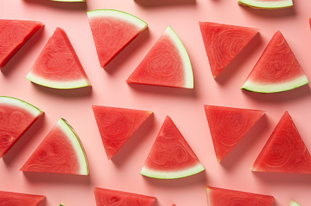 Sliced watermelon on pink background. Generative AI, a Food & Drink Photo by AlyaAnd