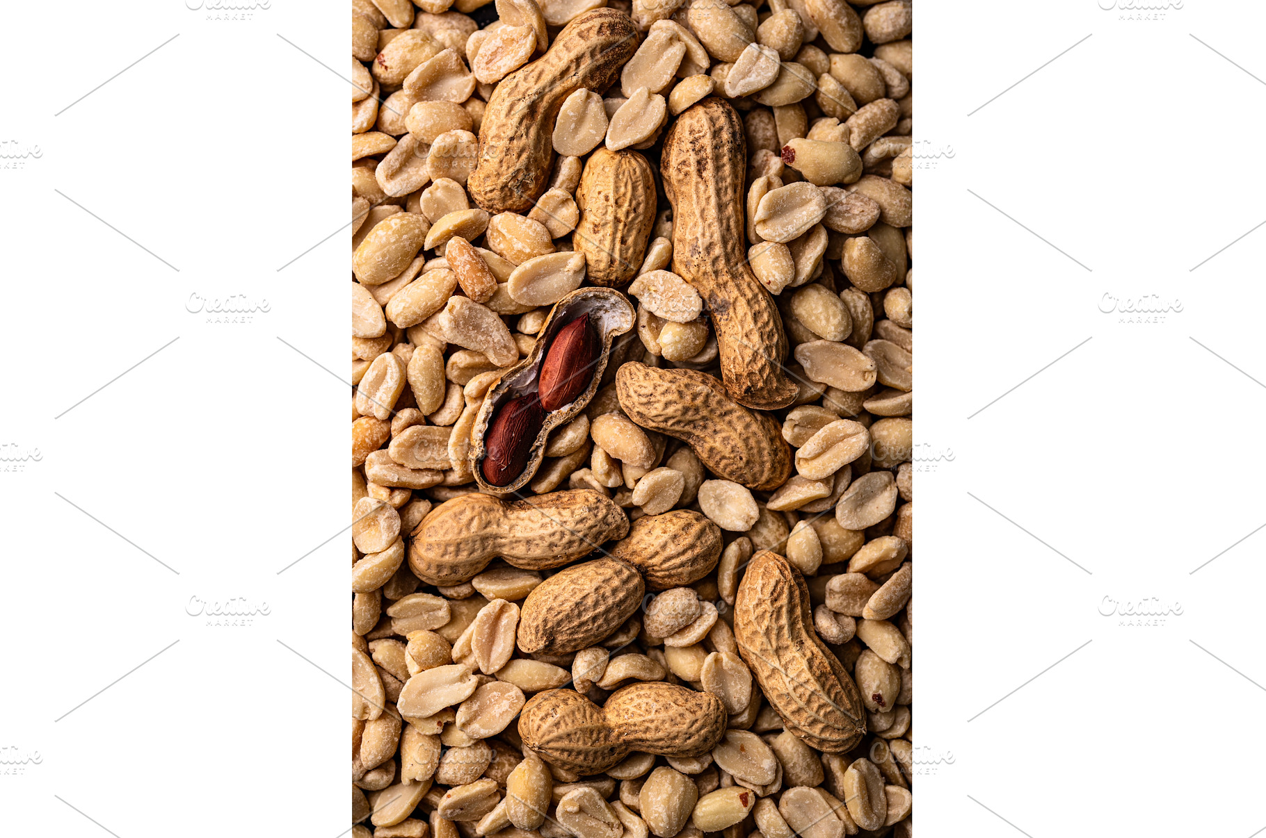 Pile of peanuts with one partially, a Food & Drink Photo by Yulia Furman