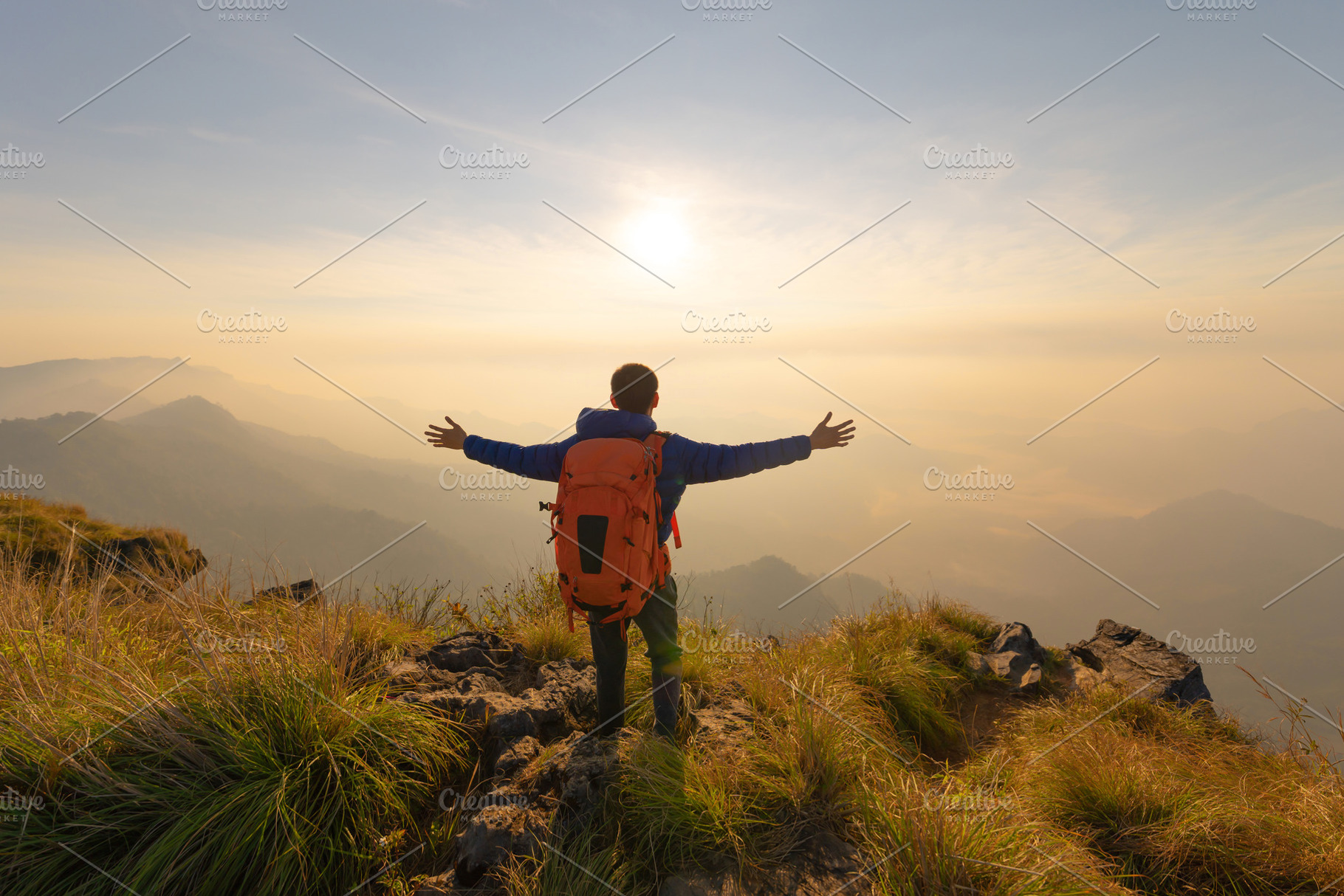 Portrait of Asian man, a tourist or backpacker, travel on green, a Person Photo by Tampatra