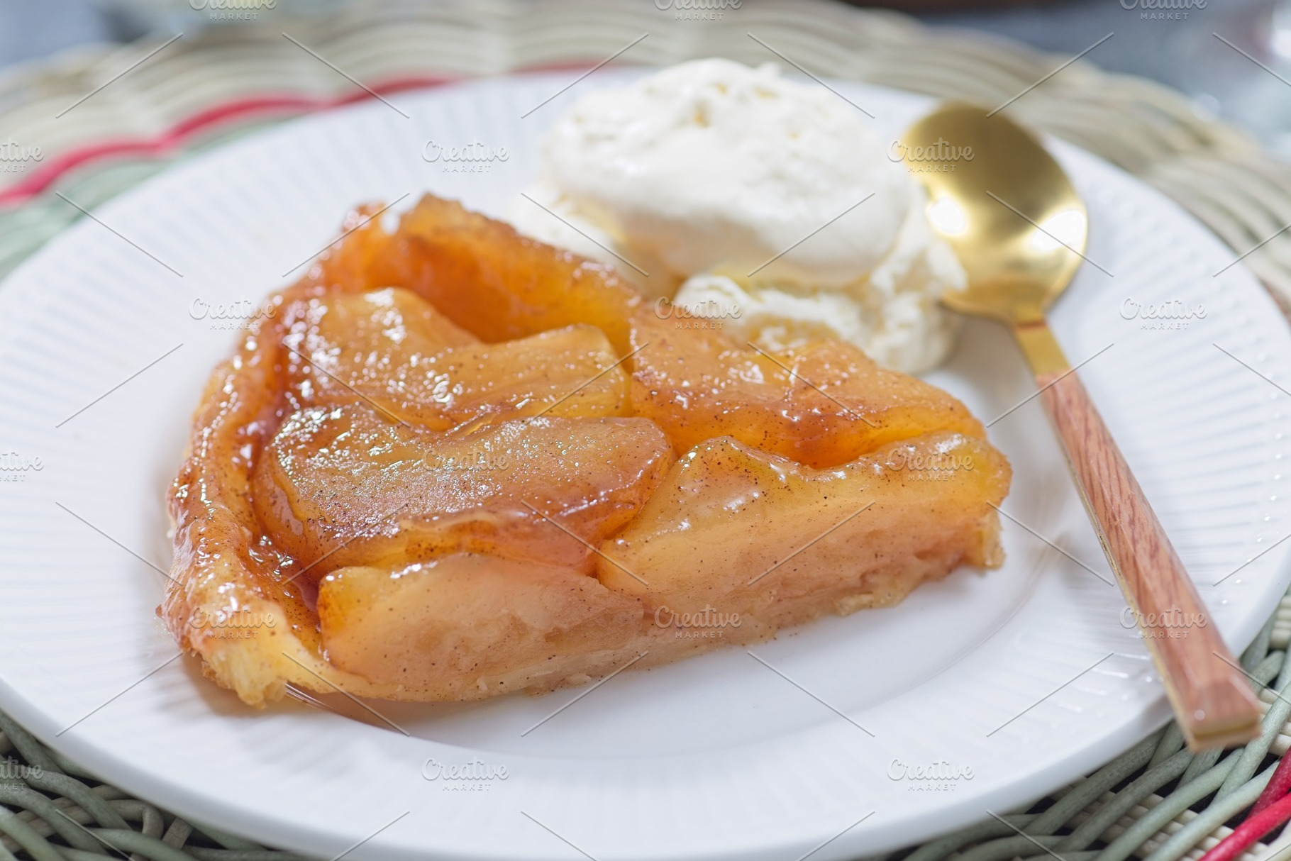 Slice of caramelized apple Tart Tartin with whipped cream, french upside down c, a Food & Drink Photo by iuliia_n