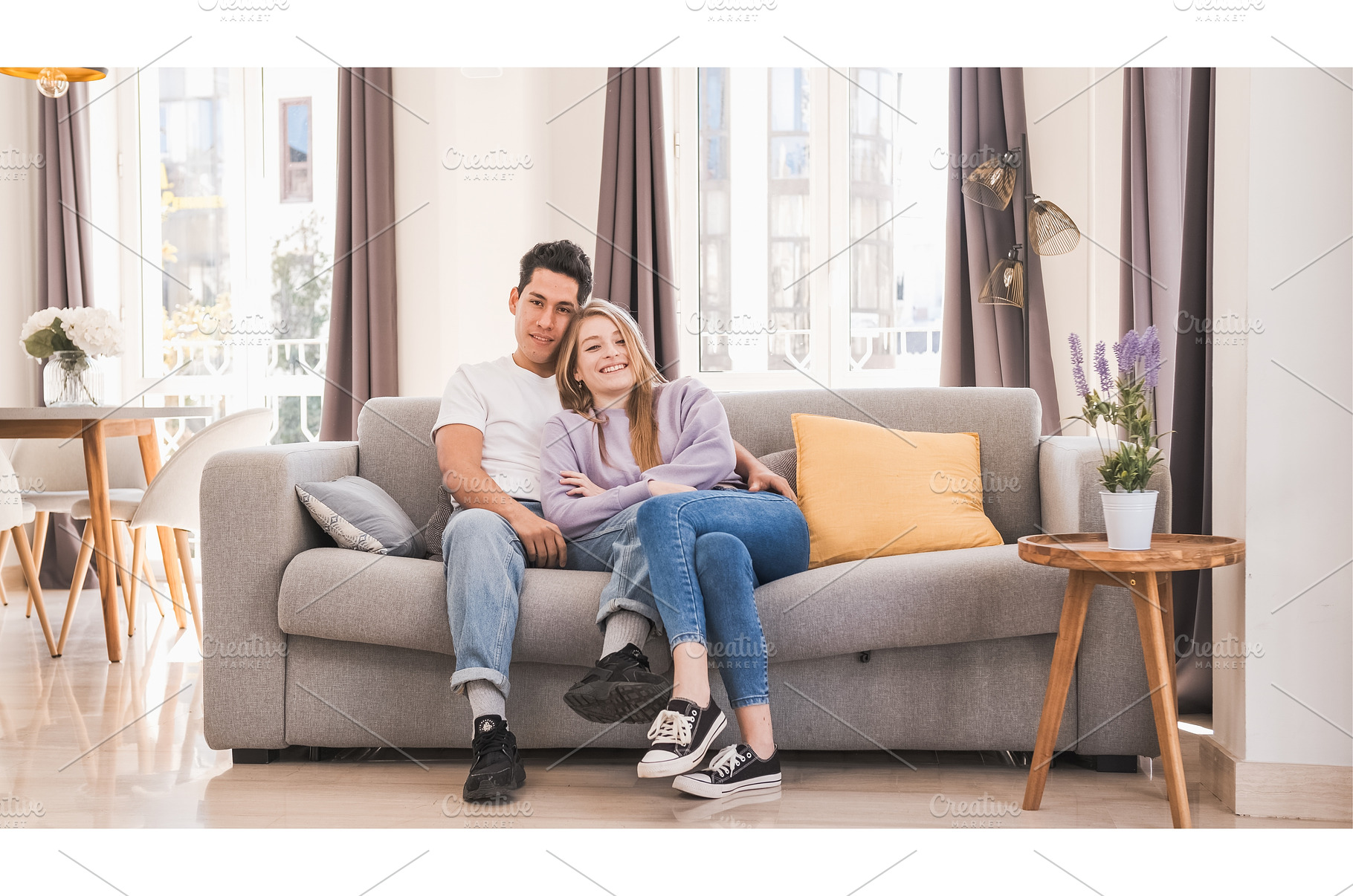 Portrait of young couple smiling and, a Photo by Daniel Megias