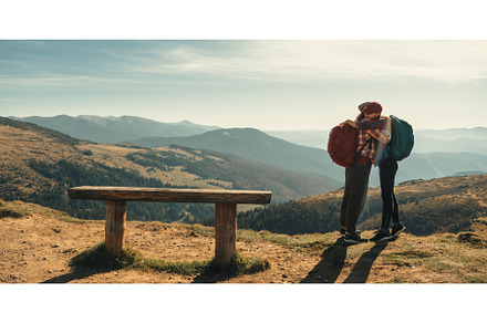 Couple of Hikers With Backpacks in